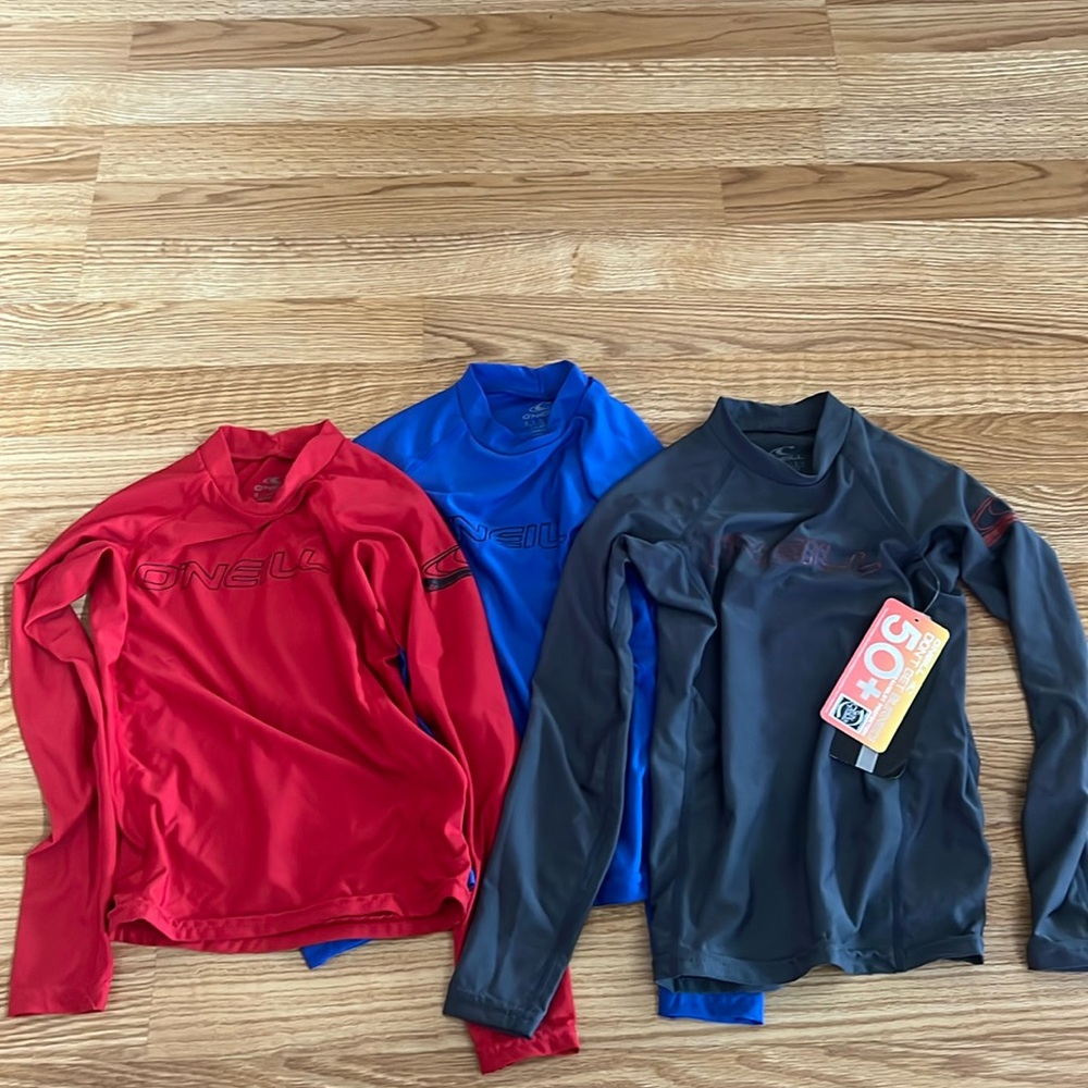 O’Neill boys rash guards. Selling all together